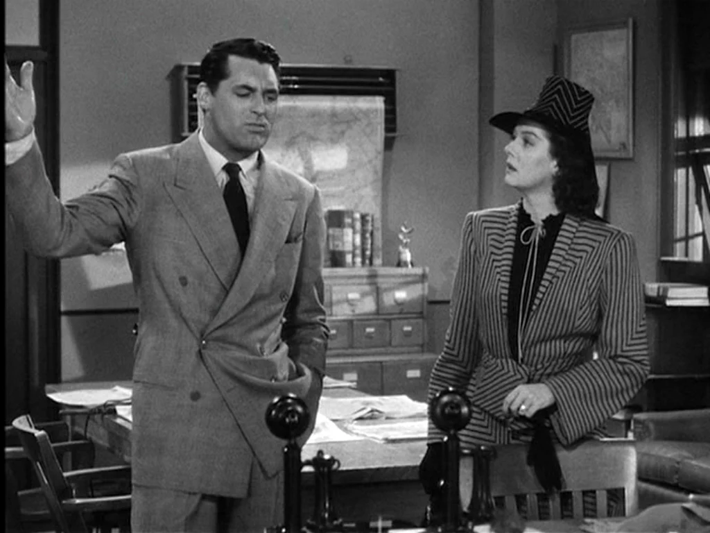 Cary Grant in a double-breasted suit in the movie "His Girl Friday."